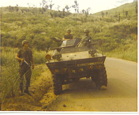 127th MP Company V-100 Shortimers Escort broken down in the An Khe pass Dec 19,1970, while artillery