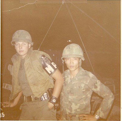 MP_and_ARVN_LT_at_scene_of_a_fire_during_TET_71_in_Qui_Nhon