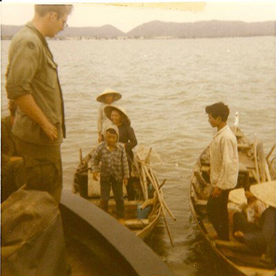Men_of_the_458th_PBR_checking_a_fishing_boat
