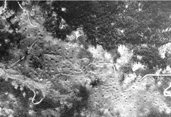 Cratering on Route 15 near Mu Gia Pass from B&#8211;52 bombing in April 1966.