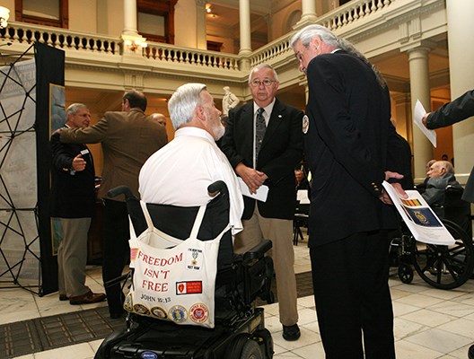 Vietnam Veterans converse during the Governor of Georgia&#39;s 50th Anniversary of the Vietnam War cerem