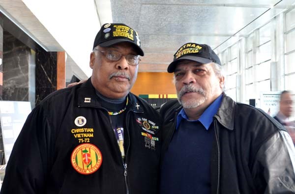 Old friends pose for a pic during a ceremony at the New York City Vietnam Veterans Recognition Day