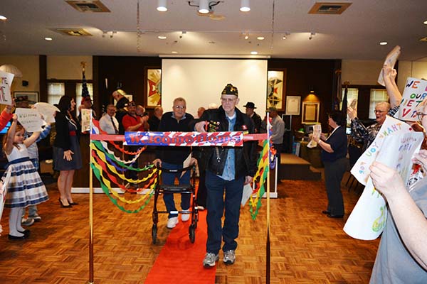 Vietnam veterans walk the red carpet.