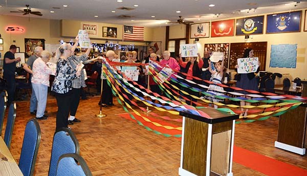Families and friends of Vietnam veterans prepare to &#34;Welcome Home&#34; Vietnam veterans.