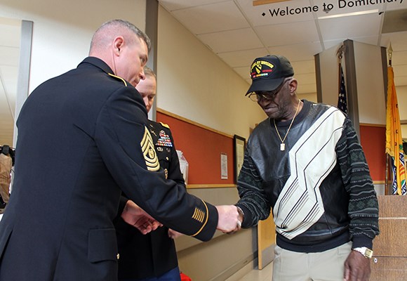 Col. Andrew Shoffner presents the Vietnam Veteran Lapel Pin