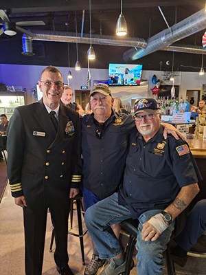 VWC Chief, Public Engagement, Cmdr. Brian Wierzbicki, USN, stands next to the Vietnam veterans 