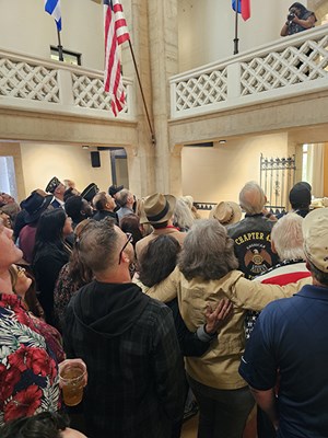 Event attendees pose for a group photo.