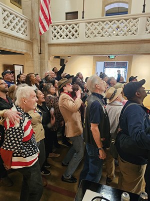 Event attendees pose for a group photo.