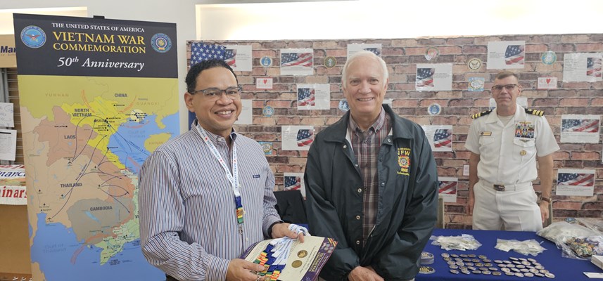 CDR Wierzbicki &#40;back&#41; and Ben Bryant greet a Vietnam veteran at the Richmond VA Medical Center.