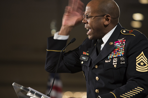 Retired Army Command Sgt. Maj. Rodwell Forbes gives a moving speech.