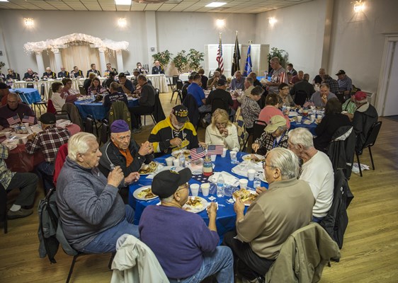 Vietnam Veterans enjoying breakfast.