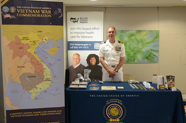VWC's Cmdr Brian Wierzbicki helps manage the VWC display table.