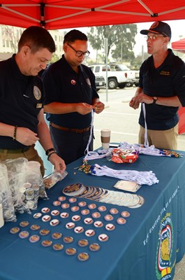 VWC staff work the outdoor VWC display table and booth.