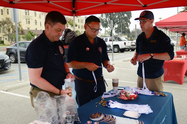 VWC staff work the outdoor VWC display table and booth.