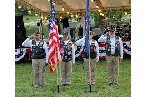Four Veterans Saluting