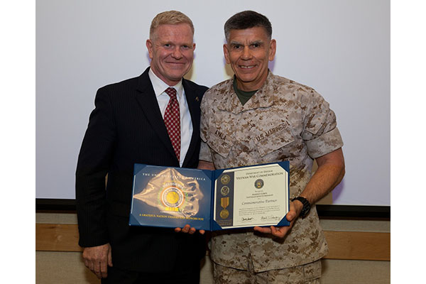 VIETNAM 50TH ANNIVERSARY COMMEMORATIVE PROGRAM CERTIFICATE PRESENTED TO MCICOM.  Major General Peter