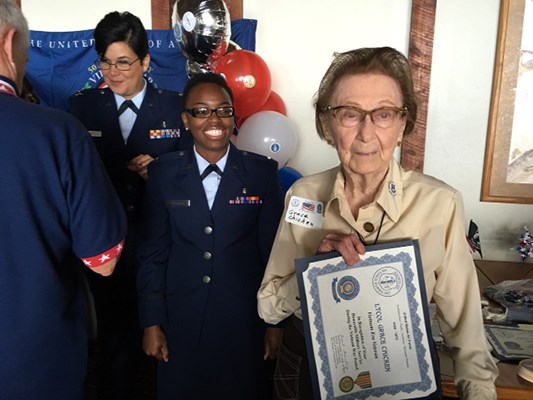 Grace Chicken Receiveing Her Lapel Pin