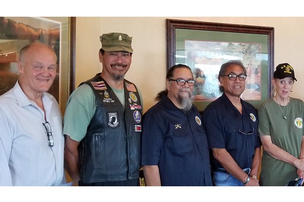  Secretary Patti Bagley presented VIetnam veterans with lapel pins and proclamations and guests with