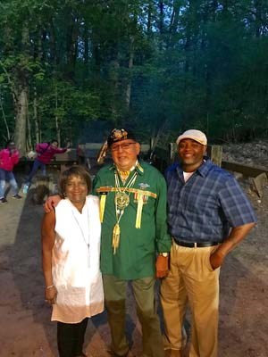 Flag-raising in honor of fallen heroes in a outdoor amphitheater in the Menominee Nation.