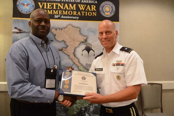 U.S. Army Brig. Gen. Mark Spindler presents Certificates of Honor