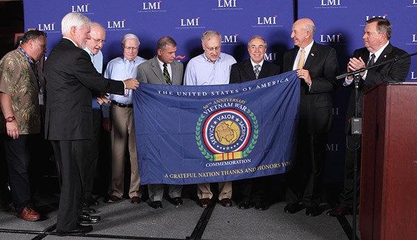 LMI Vietnam veterans join LMI President Mr. Nelson M. Ford (third from left) and U.S. Army Lt. Gen.