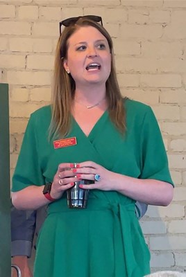 Nikki Stratton speaking during dinner presentation.