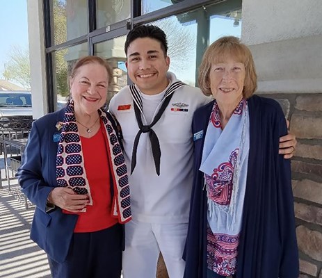 Petty Officer 2nd Class Romero with DAR chapter members. 