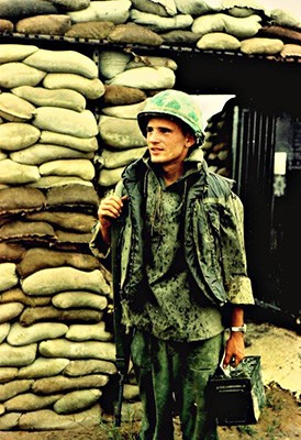 John Roland loading up from the ammo bunker Bien Hoa March 1968 Another night of guard duty during T