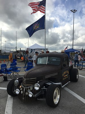 The Vietnam Veterans Tribute Truck was displayed with the VWC flag waving proudly in the background.