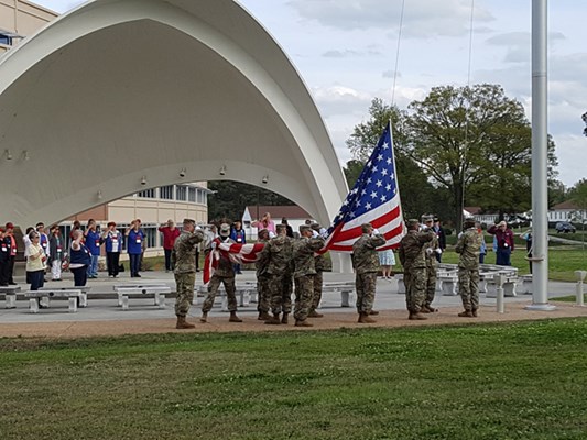 Vietnam Women Veterans salute a retreat ceremony on April at Fort Lee, Virginia.
