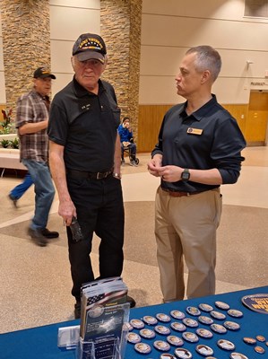 VWC's Henry Polczer speaks with a Vietnam veteran.