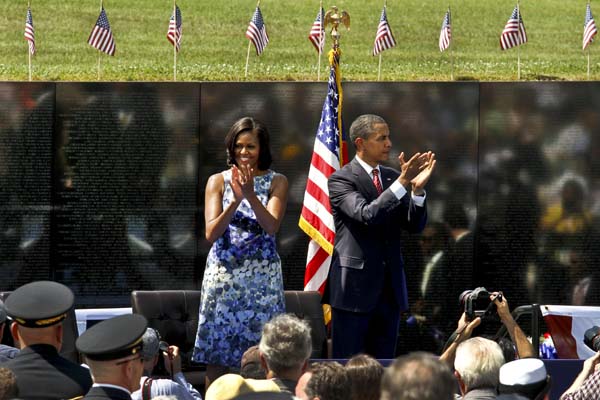President Obama and Michelle Obama at The Wall during a ceremony commemorating the 50th anniversary 