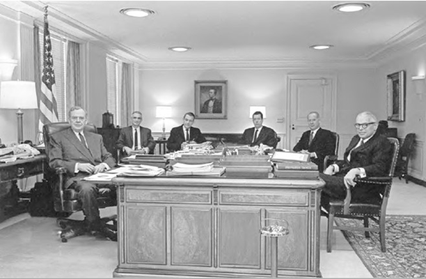 Secretary Clifford (far left) and his “8:30 Group”—the trusted advisors he met with daily. From left