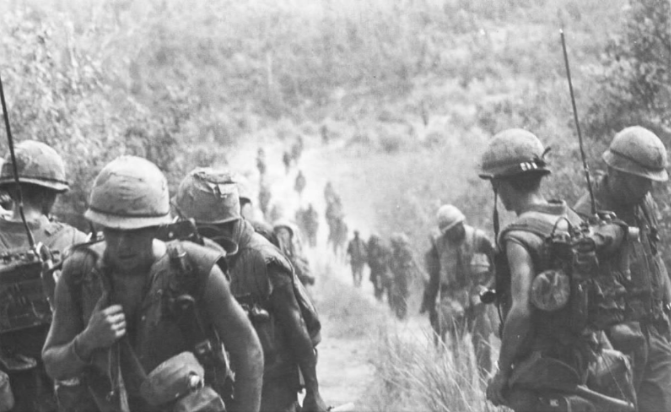 Men from the 9th Marines move to join the 4th Marines south of the DMZ at the time of Operation ARDMORE, July 30, 1967. (U.S. Marine Corps)