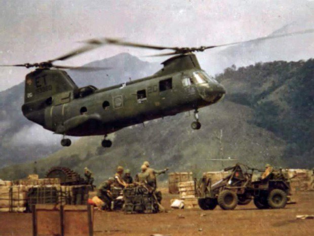 A CH-46 Sea Knight lands supplies at a Marine Corps combat base in South Vietnam, 1968. (National Archives)