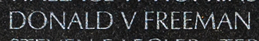 Enraving on The Wall of the name of Captain Donald V. Freeman, U.S. Army/ U.S. Agency for International Development 
