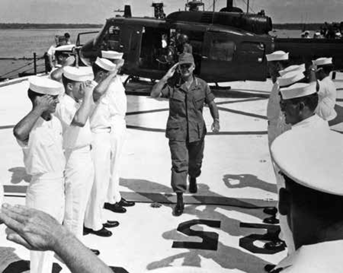 General William C. Westmoreland, CommanderU.S. Military Assistance Command, Vietnam, arrives on board self-propelled barracks ships Benewah (APB-35) to discuss Mobile Riverine Force operations with subordinate Army and Navy commanders. (USN photo)
