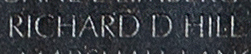 Engraving on The Wall of the name of Airman Second Class Richard D. Hill, U.S. Air Force.