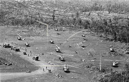 U.S. helicopters in Laos just after dropping off South Vietnamese troops and supplies during LAM SON 719, March 12, 1971. (AP photo via Defense POW/MIA Accounting Agency)
