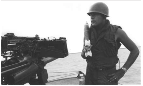 Point Banks crewman Larry Villareal ready to load the 81mm mortar.