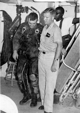 Lieutenant Commander John A. Burns (left) just after reaching the USS Jouett safely, June 19, 1968. (U.S. Navy)