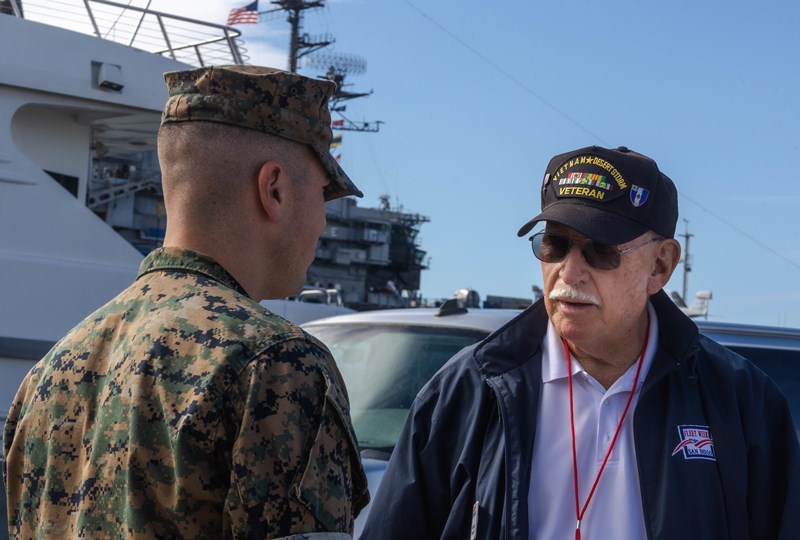 Marine talking to a Vietnam veteran during Fleet Week San Diego