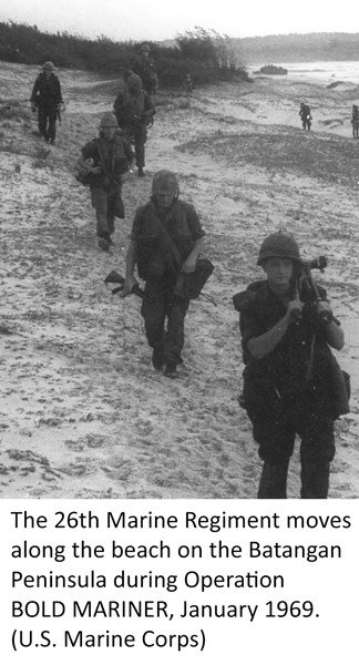 The 26th Marine Regiment moves along the beach on the Batangan Peninsula during Operation BOLD MARINER, January 1969. (U.S. Marine Corps)