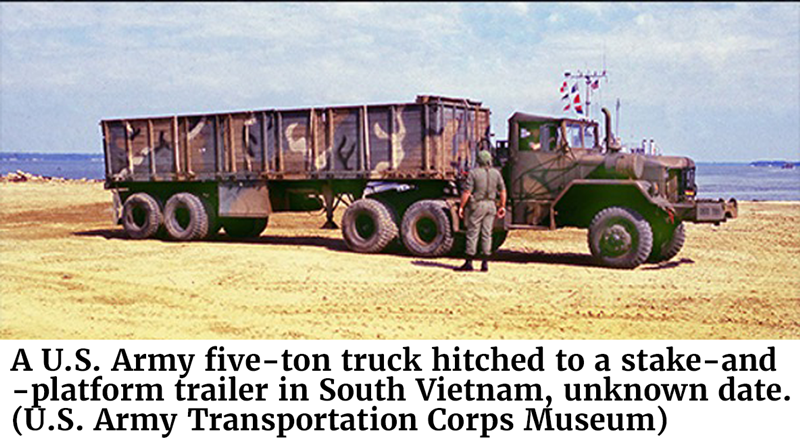 A U.S. Army five-ton truck hitched to a stake-and-platform trailer in South Vietnam, unknown date. (U.S. Army Transportation Corps Museum)