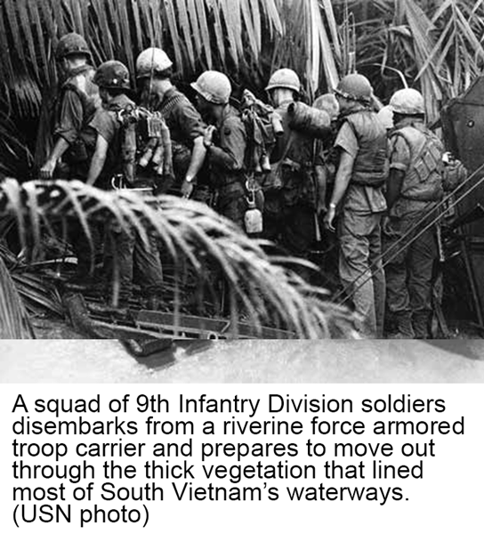 A squad of 9th Infantry Division soldiers disembarks from a riverine force armored troop carrier and prepares to move out through the thick vegetation that lined most of South Vietnam’s waterways. (USN photo)