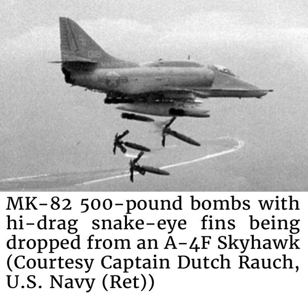 MK-82 500-pound bombs with hi-drag snake-eye fins being dropped from an A-4F Skyhawk  (Courtesy Captain Dutch Rauch, U.S. Navy (Ret))