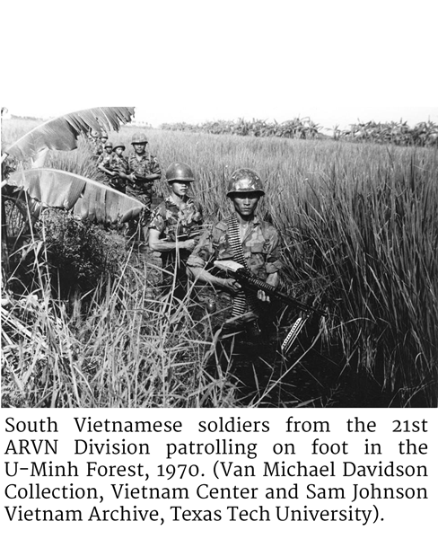 Photo of South Vietnamese soldiers from the 21st ARVN Division patrolling on foot in the U-Minh Forest, 1970. (Van Michael Davidson Collection, Vietnam Center and Sam Johnson Vietnam Archive, Texas Tech University)