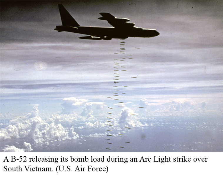 A B-52 releasing its bomb load during an Arc Light strike over South Vietnam. (U.S. Air Force)
