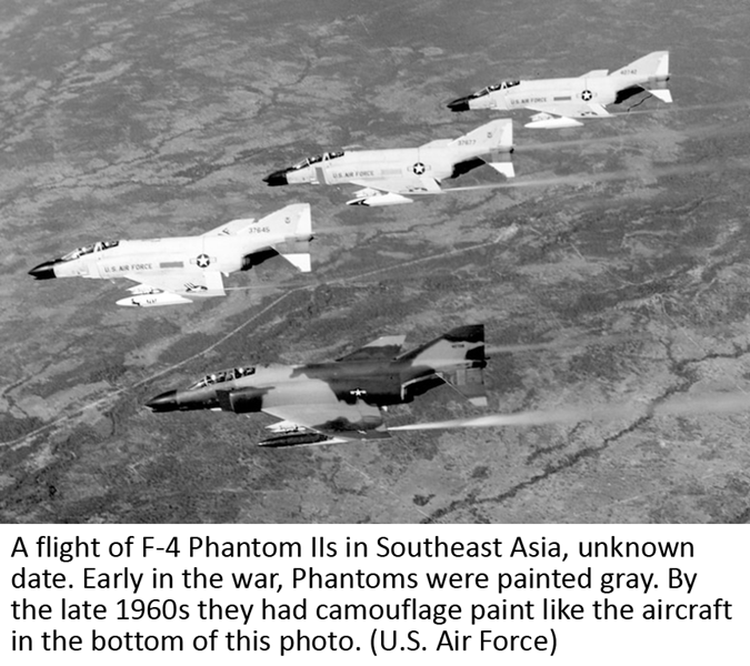 A flight of F-4 Phantom IIs in Southeast Asia, unknown date. Early in the war, Phantoms were painted gray. By the late 1960s they had camouflage paint like the aircraft in the bottom of this photo. (U.S. Air Force)