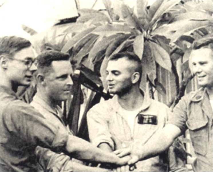 From left to right: Lance Corporal John Phelps (crew chief), Major Stephen W. Pless, Captain Rupert Fairfield (copilot), and Gunnery Sergeant Leroy Poulson (gunner), circa 1967. (U.S. Marine Corps)